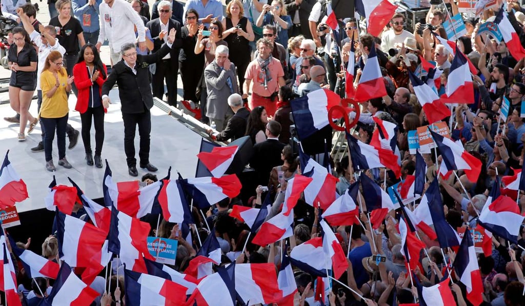 Jean-Luc Melenchon salutes supporters after a political rally in Marseilleon Sunday. Photo: Reuters