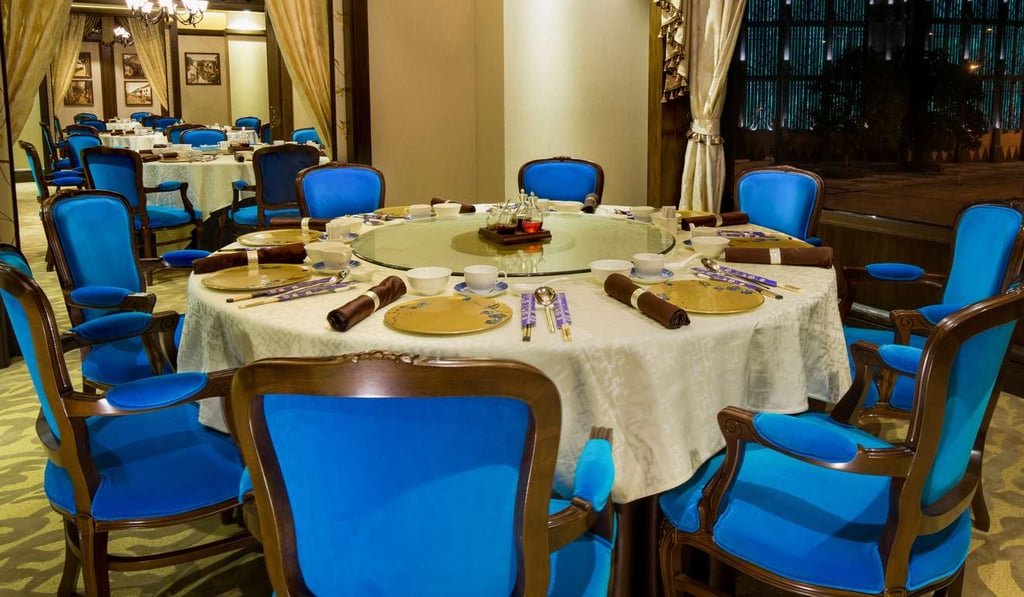 Bright peacock-blue chairs make a statement at Jade Orchid.