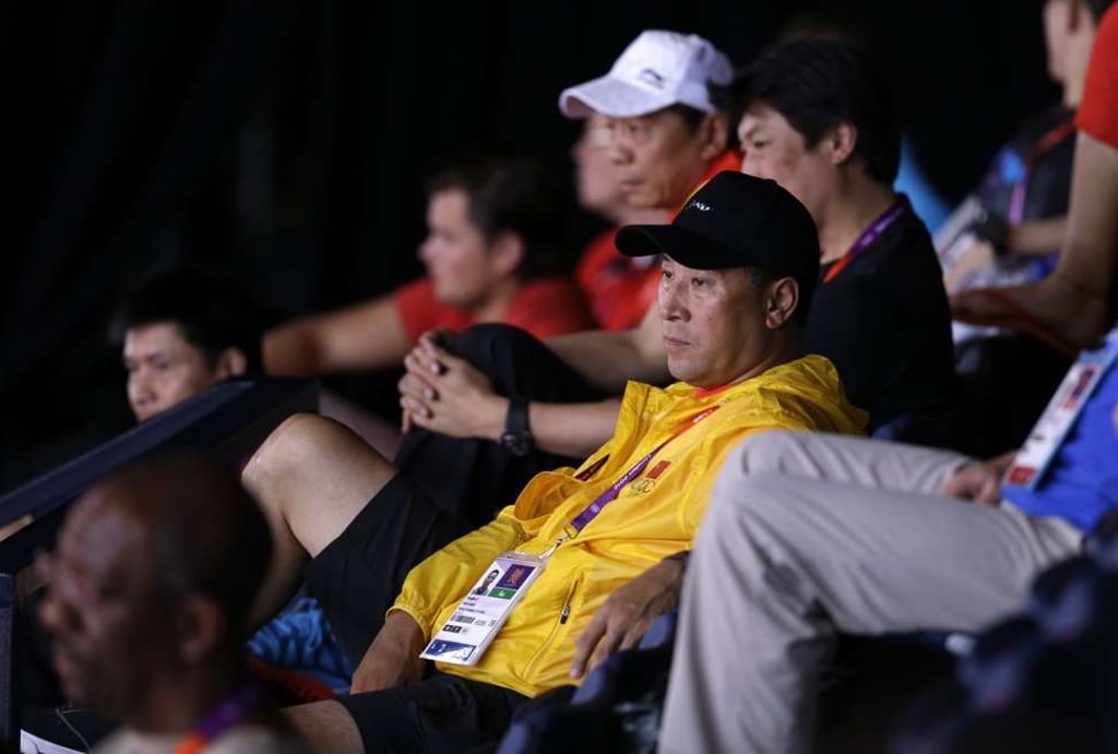 Li watches from the gallery at the 2012 Olympics.