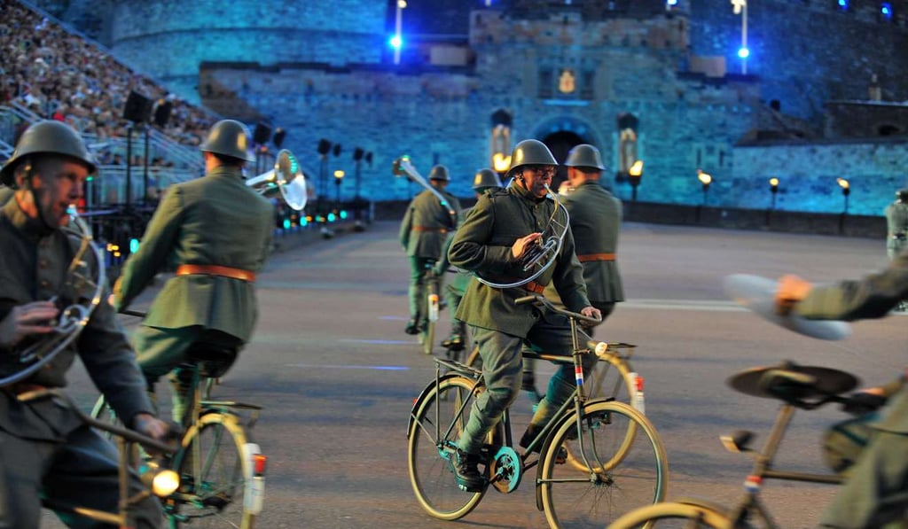 the Band of the Royal Netherlands Army Mounted Regiments cycling while playing instruments. Photo: Handout