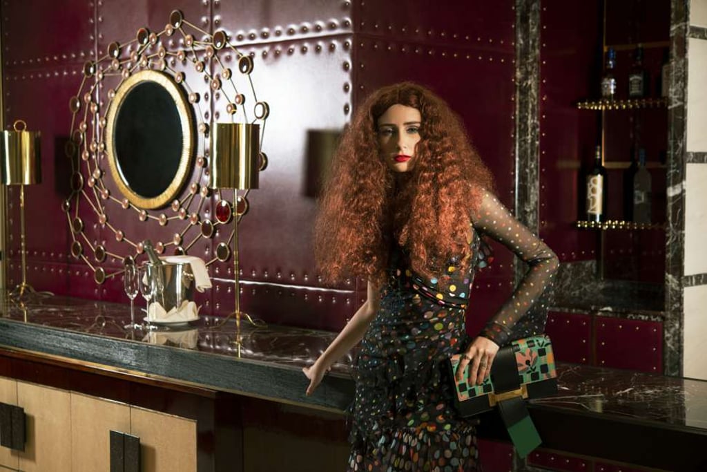 GIVENCHY Top and dress PRADA Bag GUCCI Rings