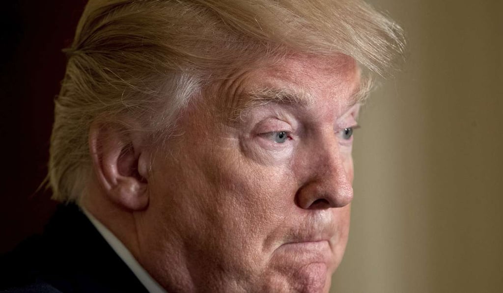 President Donald Trump pauses during a news conference with Nato Secretary General Jens Stoltenberg in the East Room at the White House in Washington. Photo: AP President Donald Trump pauses during a news conference with Nato Secretary General Jens Stoltenberg in the East Room at the White House in Washington. Photo: AP