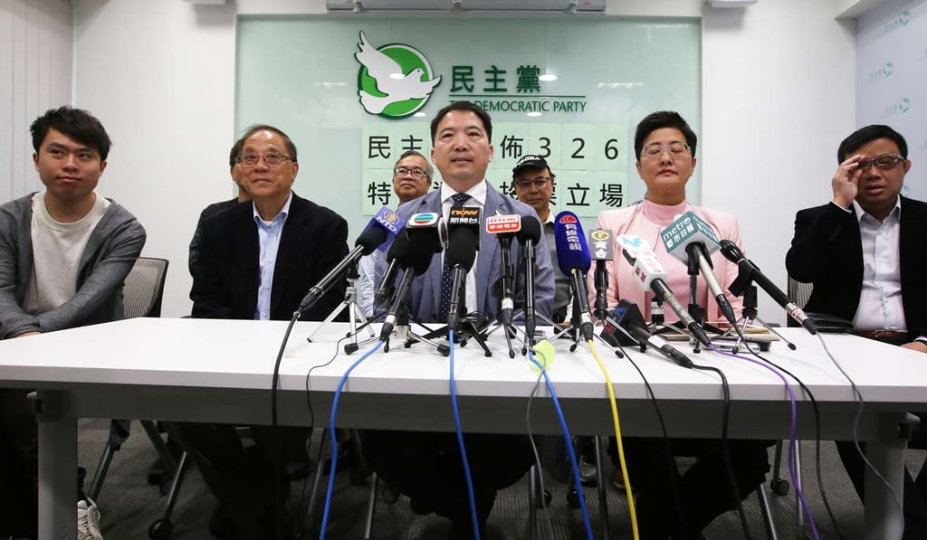 Wu Chi-wai (centre) with fellow Democratic Party members (left to right) Roy Kwong Chun-yu, Yeung Sum, Helena Wong Pik-wan and James To Kun-sun, at a press conference to announce the Democrats’ voting preference in the Hong Kong chief executive election, at Hanley House in Prince Edward on March 20. Photo: Edward Wong