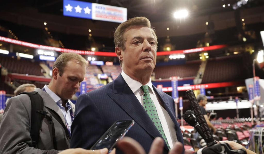 Paul Manafort talks to reporters on the floor of the Republican National Convention at Quicken Loans Arena in Cleveland last July 17. Photo: AP Paul Manafort talks to reporters on the floor of the Republican National Convention at Quicken Loans Arena in Cleveland last July 17. Photo: AP
