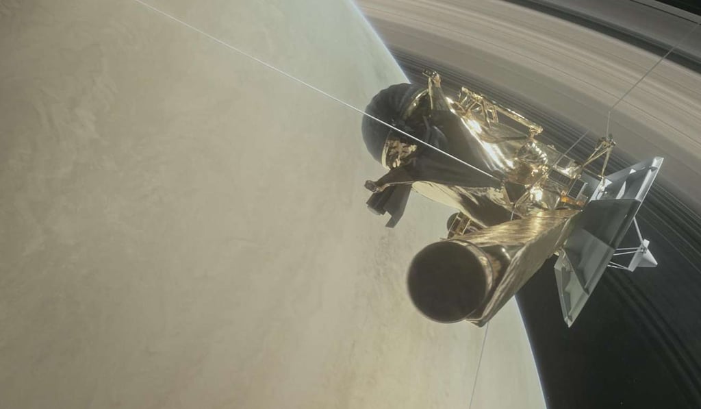 This NASA handout shows NASA's Cassini spacecraft about to make one of its dives between Saturn and its innermost rings as part of the mission's grand finale. Cassini will make 22 orbits that swoop between the rings and the planet before ending its mission on September 15, 2017, with a final plunge into Saturn. Cassini has made numerous dramatic discoveries, including a global ocean that showed indications of hydrothermal activity within the icy moon Enceladus, and liquid methane seas on its moon Titan. Photo: AFP