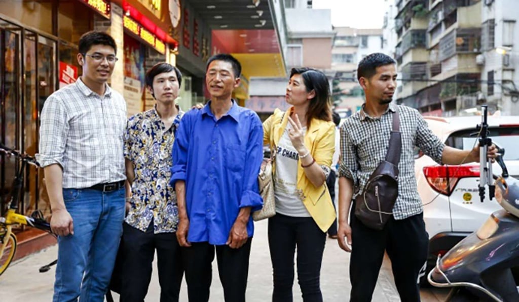 Li Hongfeng, centre, was reunited with his family with Tsai’s assistance. Photo: Handout