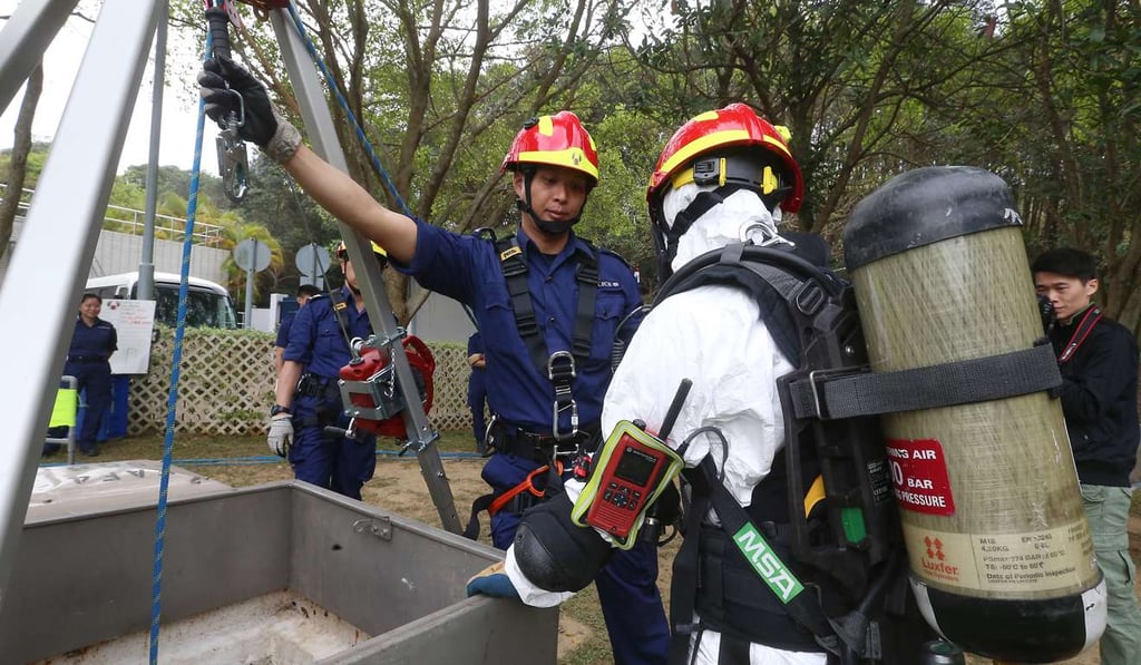The confined space search team will be part of a 400-strong search team deployed in the search for weapons, bombs and any signs of danger during events to mark the occasion in July. Photo: K. Y. Cheng