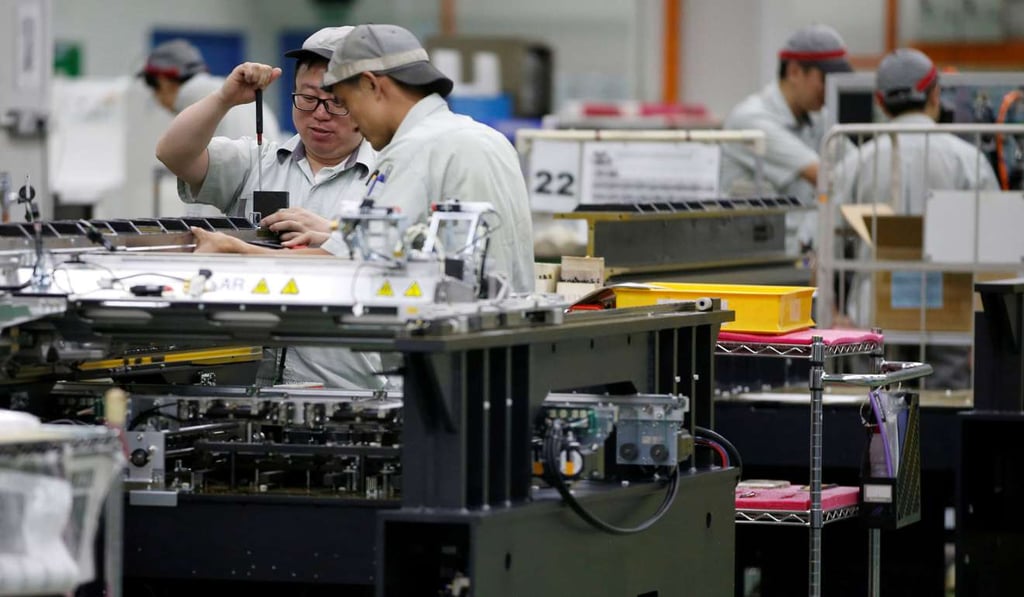 Asia-Pacific countries are looking into the idea of a universal basic income as low-paid jobs, such as factory work, becomes increasingly under threat from machines and automation. Photo: Reuters
