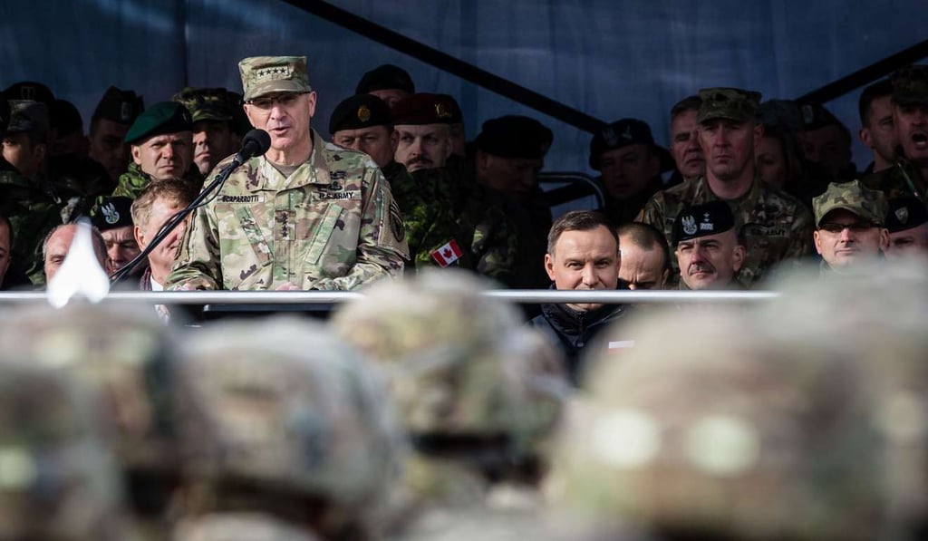 NATO Supreme Allied Commander US General Curtis Scaparrotti (L) speaks at the official welcoming ceremony for NATO troops - part of The Enhanced Forward Presence, in Orzysz, Poland April 13, 2017. The batallion is one of four NATO is deploying for the first time to Poland and the Baltic states as trip wires against Russian adventurism on its eastern flank. Photo: AFP NATO Supreme Allied Commander US General Curtis Scaparrotti (L) speaks at the official welcoming ceremony for NATO troops - part of The Enhanced Forward Presence, in Orzysz, Poland April 13, 2017. The batallion is one of four NATO is deploying for the first time to Poland and the Baltic states as trip wires against Russian adventurism on its eastern flank. Photo: AFP