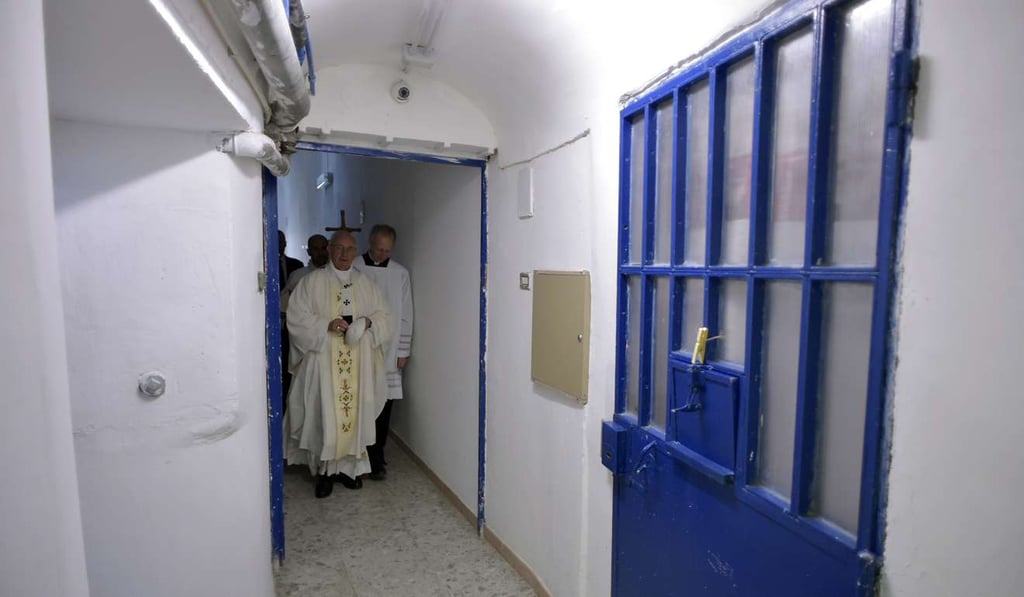 Pope Francis walks inside the Paliano prison. Photo: AP