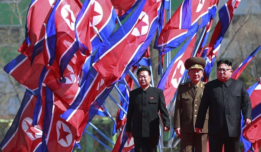 North Korean leader Kim Jong-un (right) arrives for an opening ceremony of a new residential housing project on Ryo Myong street in Pyongyang, North Korea, on Thursday. Tensions are rising in the region over North Korea’s nuclear programmer. Photo: EPA North Korean leader Kim Jong-un (right) arrives for an opening ceremony of a new residential housing project on Ryo Myong street in Pyongyang, North Korea, on Thursday. Tensions are rising in the region over North Korea’s nuclear programmer. Photo: EPA