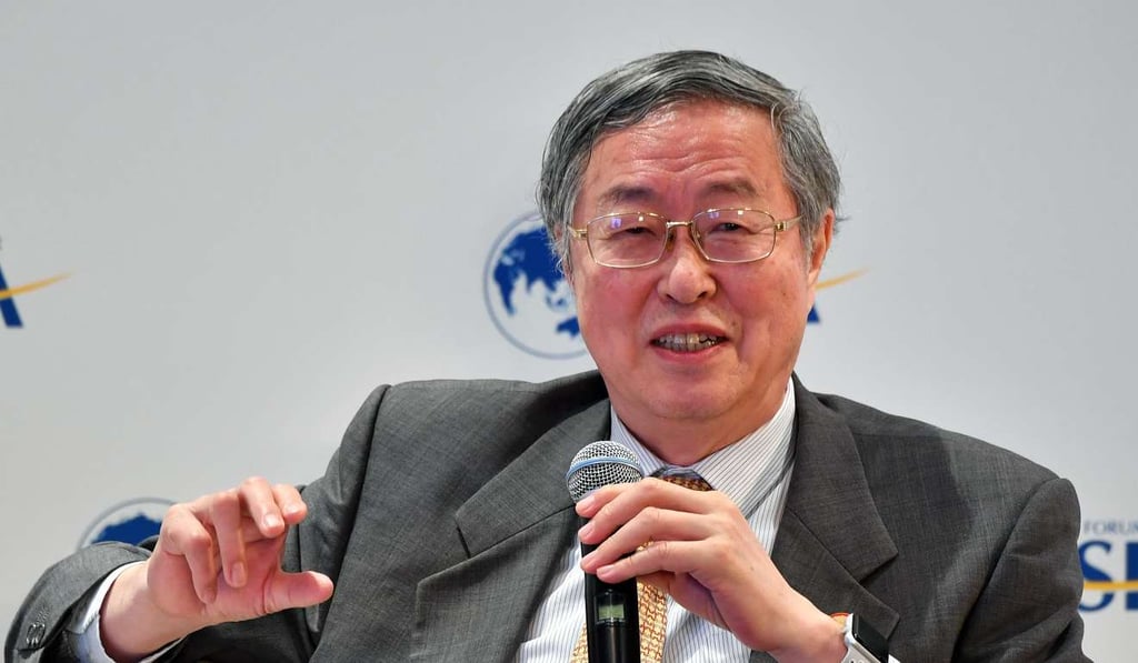 Central bank governor Zhou Xiaochuan has encouraged banks to put all their credit activities on the books. Photo: Xinhua