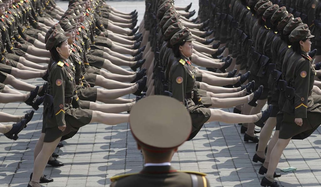 North Korean women soldiers take part in a military parade. Photo: AP North Korean women soldiers take part in a military parade. Photo: AP