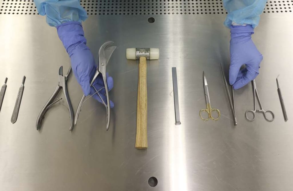 Pasu Ng Kwai-lun shows off the tools of his embalming trade. Photo: K.Y. Cheng