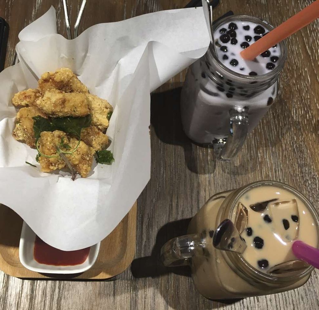 Fried salt chicken nugget, taro milk tea with bubble and milk tea with bubble. Fried salt chicken nugget, taro milk tea with bubble and milk tea with bubble.