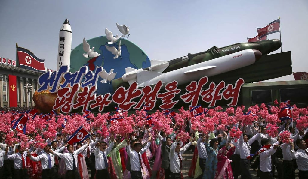 A float with model missiles and rockets reads "for peace and stability  in the world", part of a parade on Saturday in Pyongyang. Photo: AP