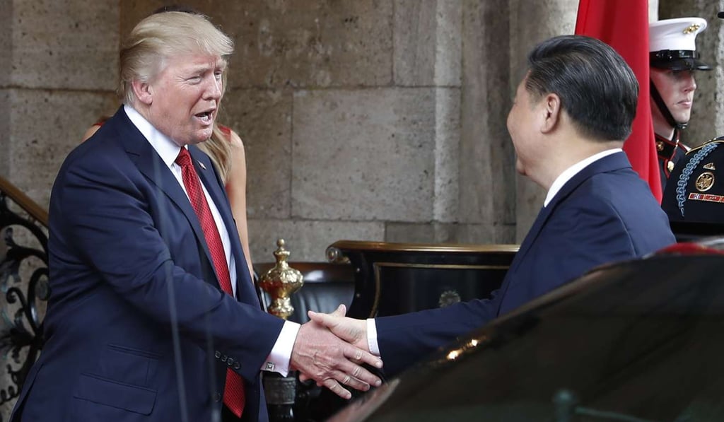 President Donald Trump shakes hands with Chinese President Xi Jinping as he arrives before dinner at Mar-a-Lago resort, in Palm Beach, Florida. Photo: AP President Donald Trump shakes hands with Chinese President Xi Jinping as he arrives before dinner at Mar-a-Lago resort, in Palm Beach, Florida. Photo: AP