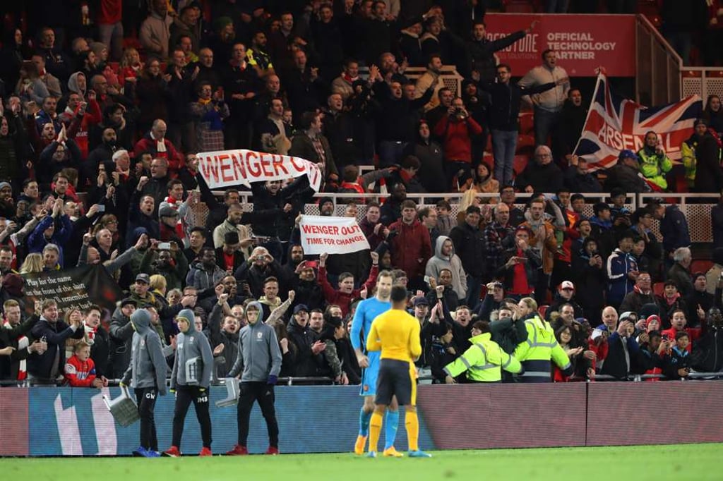 Arsenal fans wanting Wenger to vacate his post were still in full voice despite the win. Photo: Reuters