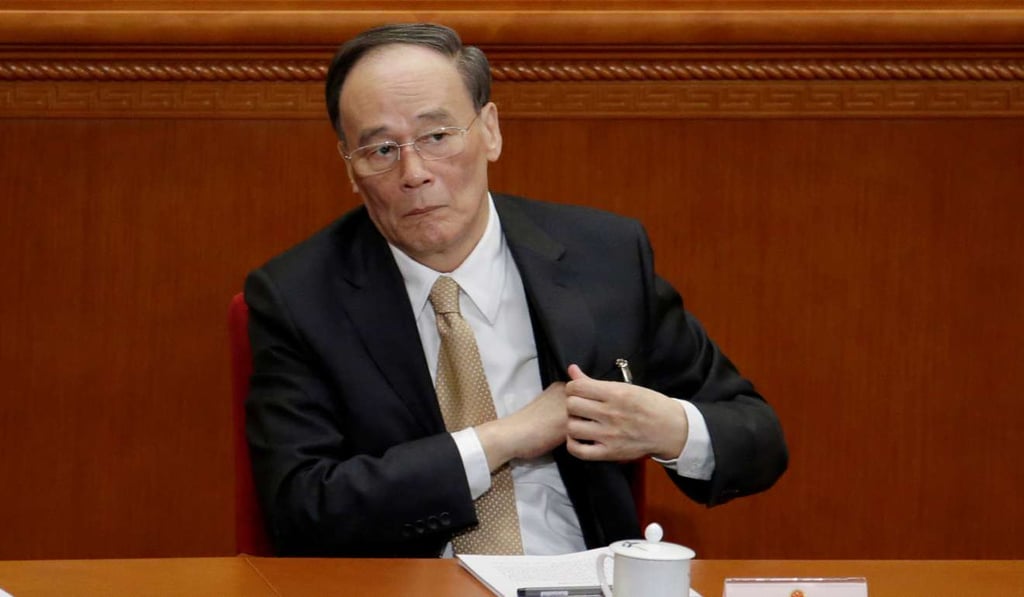 Wang Qishan, the head of China's anti-corruption watchdog, attends the opening session of the National People's Congress in Beijing in March. Photo: Reuters