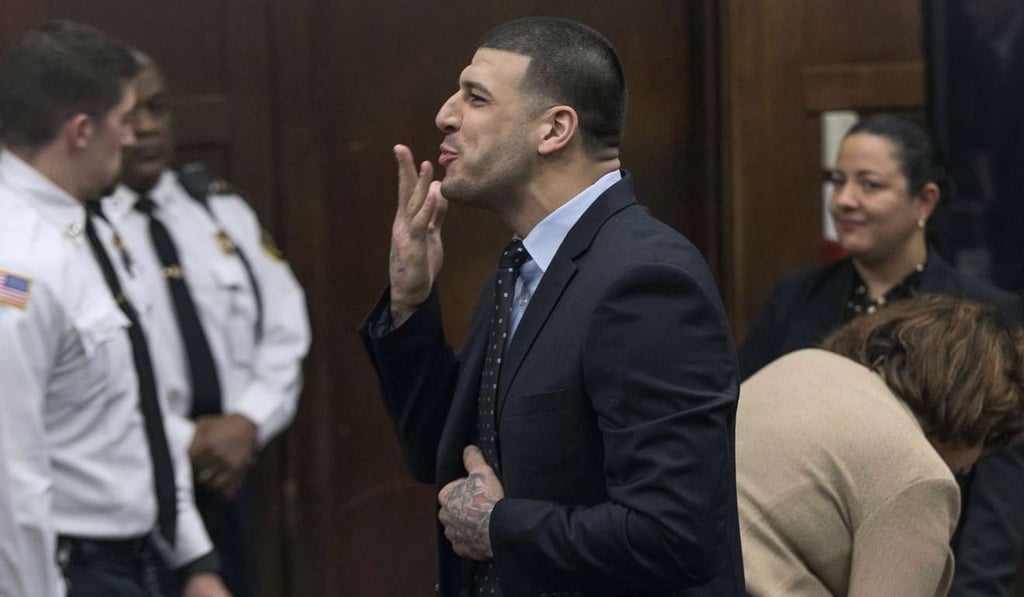 Former New England Patriots tight end Aaron Hernandez blows a kiss to his daughter, who was sitting with her mother, Shayanna Jenkins, who was Hernandez's long-time fiancée, during jury deliberations in his double-murder trial at Suffolk Superior Court in Boston. Former New England Patriots tight end Aaron Hernandez blows a kiss to his daughter, who was sitting with her mother, Shayanna Jenkins, who was Hernandez's long-time fiancée, during jury deliberations in his double-murder trial at Suffolk Superior Court in Boston.