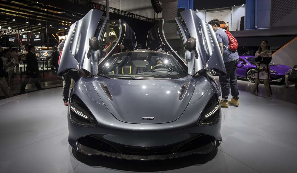 A McLaren Automotive Ltd. 720S luxury automobile stands on display at the Shanghai Motor Show. McLaren’s latest mid-engine, rear-wheel-drive two-seater lighter and faster than the 650S, with a twin-turbocharged 4.0-liter V8 engine and a weight of 2,828 pounds. Photo: Bloomberg