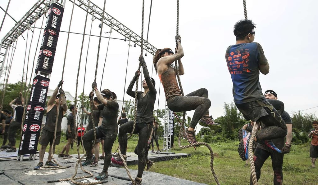 Participants compete at the Asia-Pacific Spartan Race series in Kam Tin. 22APR17 SCMP / Edward Wong