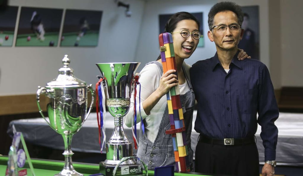 With father Ng Yam-shui at Midland Centre.