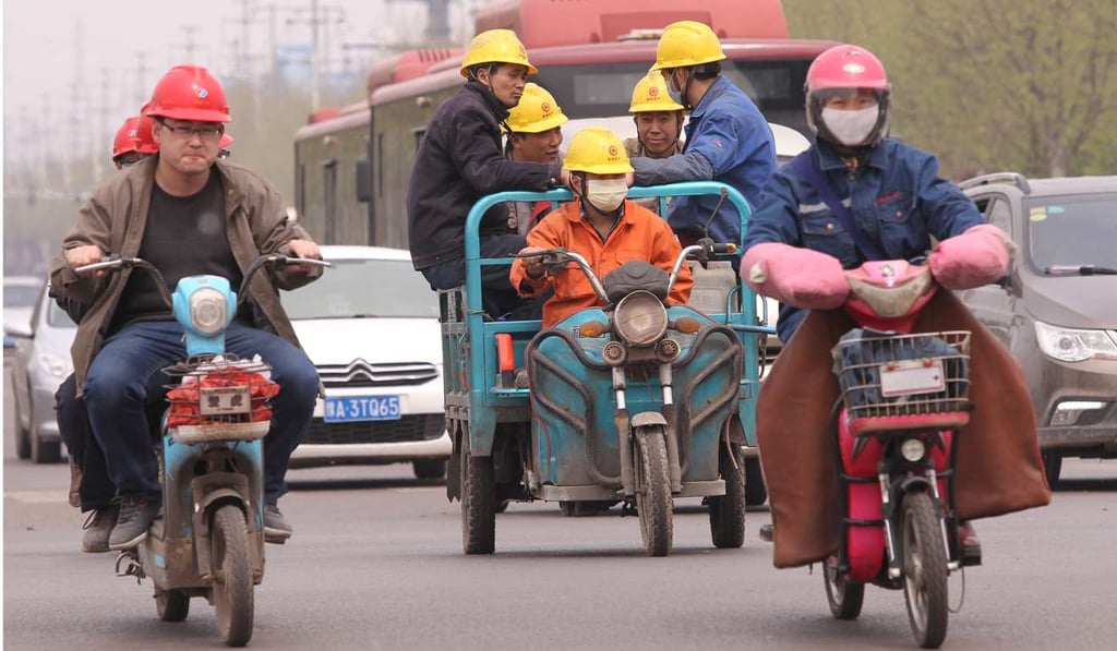 Workers commuting in Zouping county, Shandong province. Photo: Simon Song