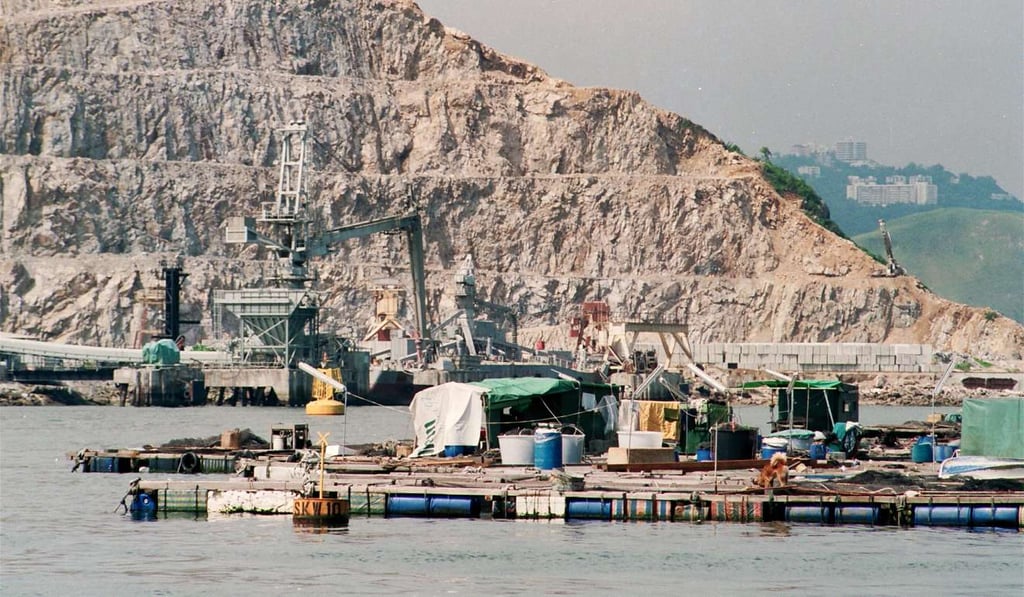 Fish rafts are seen off the coast of a quarry in Sok Kwu Wan, Lamma Island, in 1993. Quarrying was a significant industry in pre-urban Hong Kong that led to exports around the world. Photo: SCMP Pictures