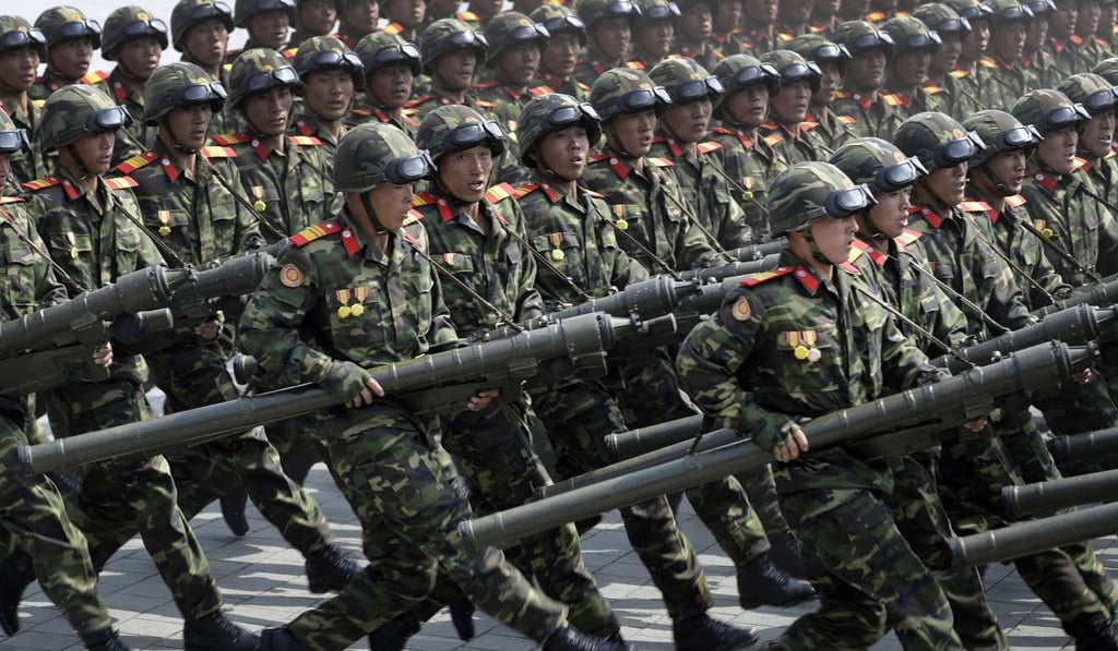 North Korean soldiers march across Kim Il-sung Square. Photo: AP North Korean soldiers march across Kim Il-sung Square. Photo: AP