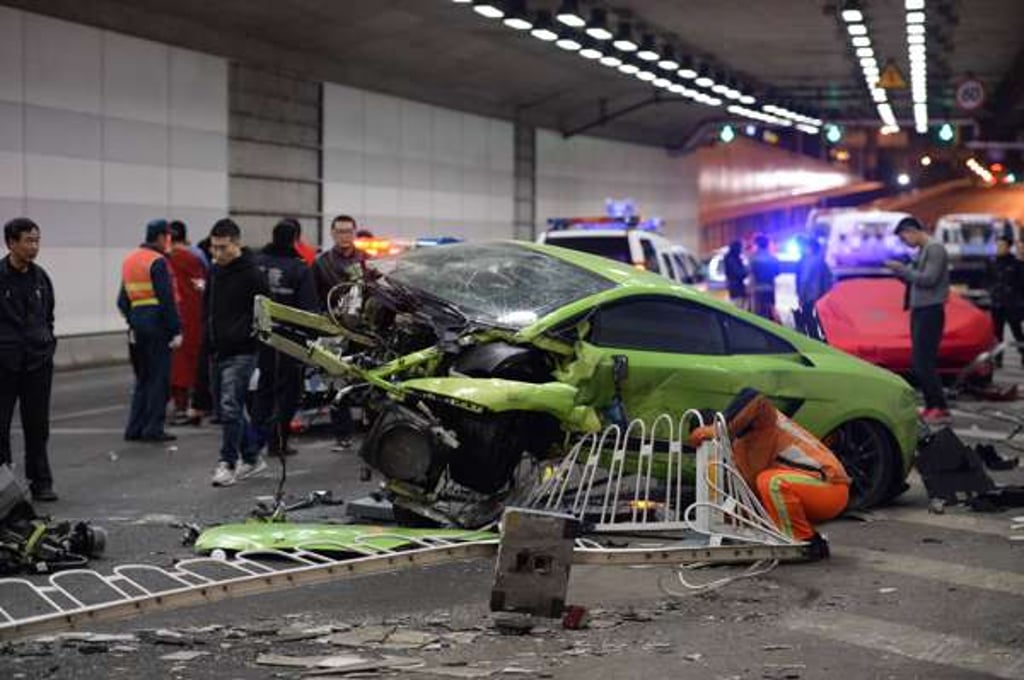 This photo taken early on April 12, 2015 shows a badly damaged Lamborghini sports car after crashing with a Ferrari in Beijing. The two cars crashed after a high-speed road race in Beijing as the stunt-filled Fast & Furious 7 movie opened in China. Photo: AFP