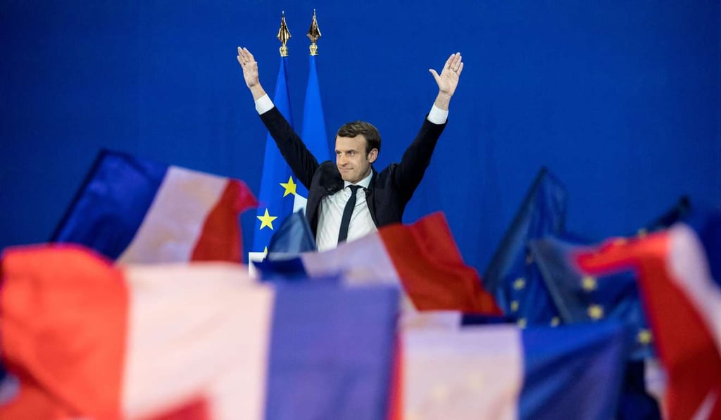 Emmanuel Macron, France's centrist presidential candidate, waves while speaking to supporters after the first round of the French presidential election in Paris on Sunday. Photo: Bloomberg Emmanuel Macron, France's centrist presidential candidate, waves while speaking to supporters after the first round of the French presidential election in Paris on Sunday. Photo: Bloomberg