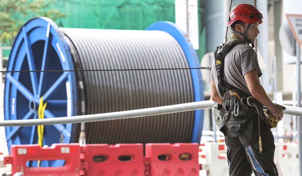 The project included replacing a 10km haul rope, which pulls the cabins, and a 14km track rope which supports their weight. Photo: Felix Wong