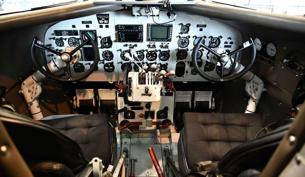 The cockpit of twin-engine propeller-driven Breitling DC-3.