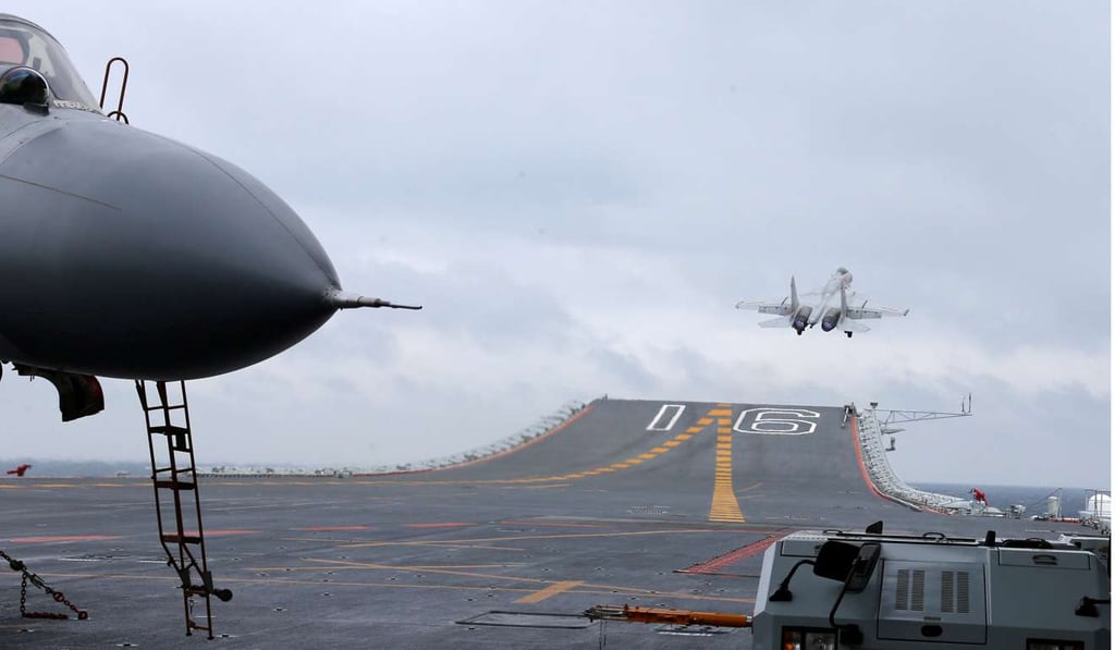 J-15 fighters take off from China's Liaoning aircraft carrier during a drill in the South China Sea, January 2, 2017. Photo: Reuters