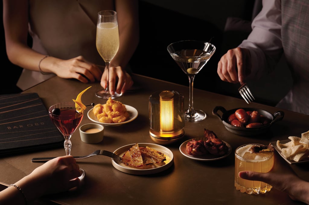 An intimate dining moment at Bar Q88, where refined cocktails and curated bites set the stage for an unforgettable evening. An intimate dining moment at Bar Q88, where refined cocktails and curated bites set the stage for an unforgettable evening.