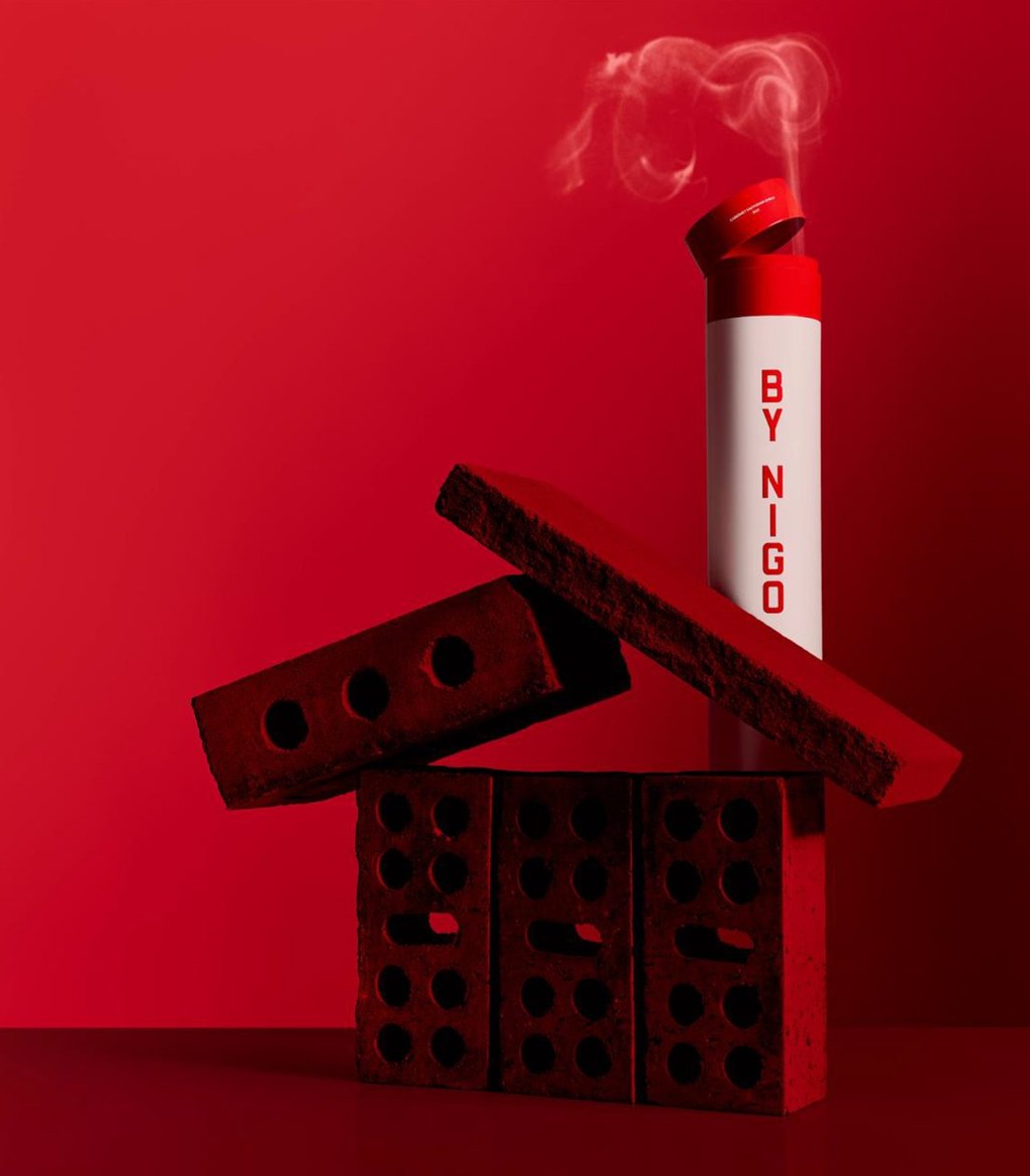 The Penfolds 65F by NIGO bottle and its cylindrical gift tin, inspired by the 65-foot chimney at Magill Estate. A seamless fusion of fine winemaking and contemporary design.
