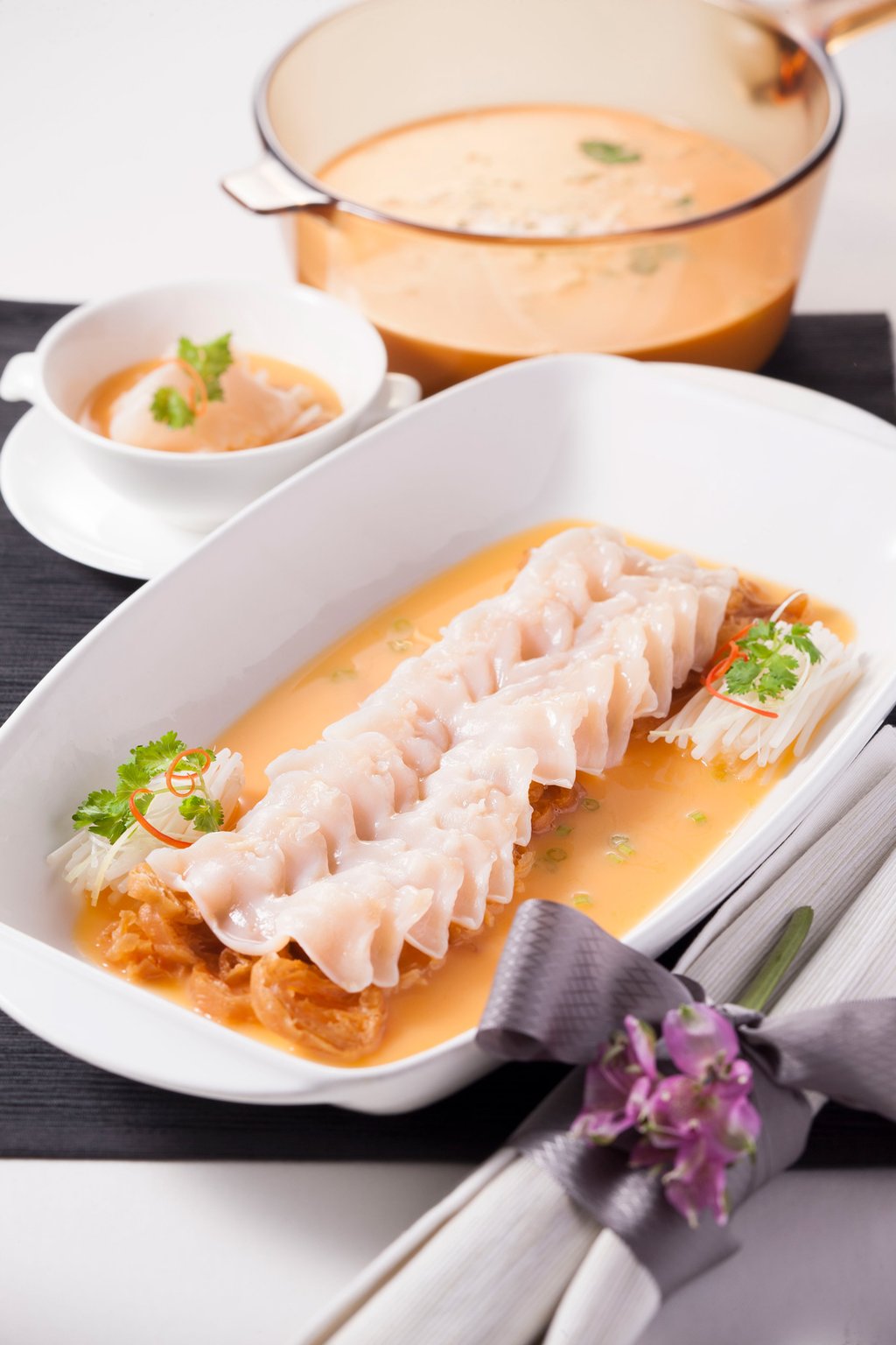 Lei Garden’s poached live geoduck in lobster soup Lei Garden’s poached live geoduck in lobster soup