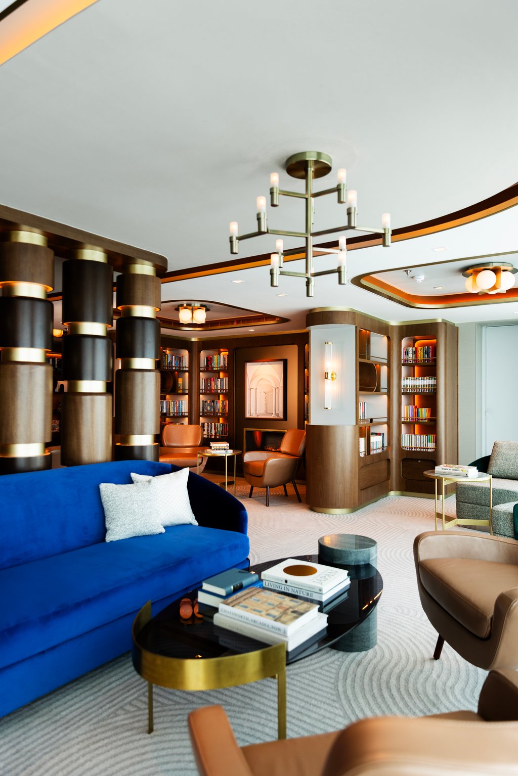 The Library aboard Oceania AlluraTM offers a tranquil space to unwind, surrounded by art, design and the quiet charm that defines small-ship luxury.