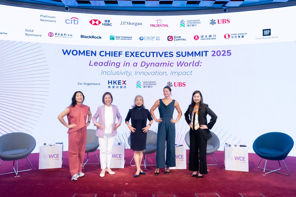 Speakers demonstrated “power poses” that help build confidence. From left to right: Angelle Siyang-Le, Director, Art Basel Hong Kong; Vicky Kong, Chief Executive, Citibank (Hong Kong) Limited; Marjorie Yang, Chairman, Esquel Group; Camille Cheng, Hong Kong Olympic swimmer; and Catherine So, CEO, South China Morning Post.