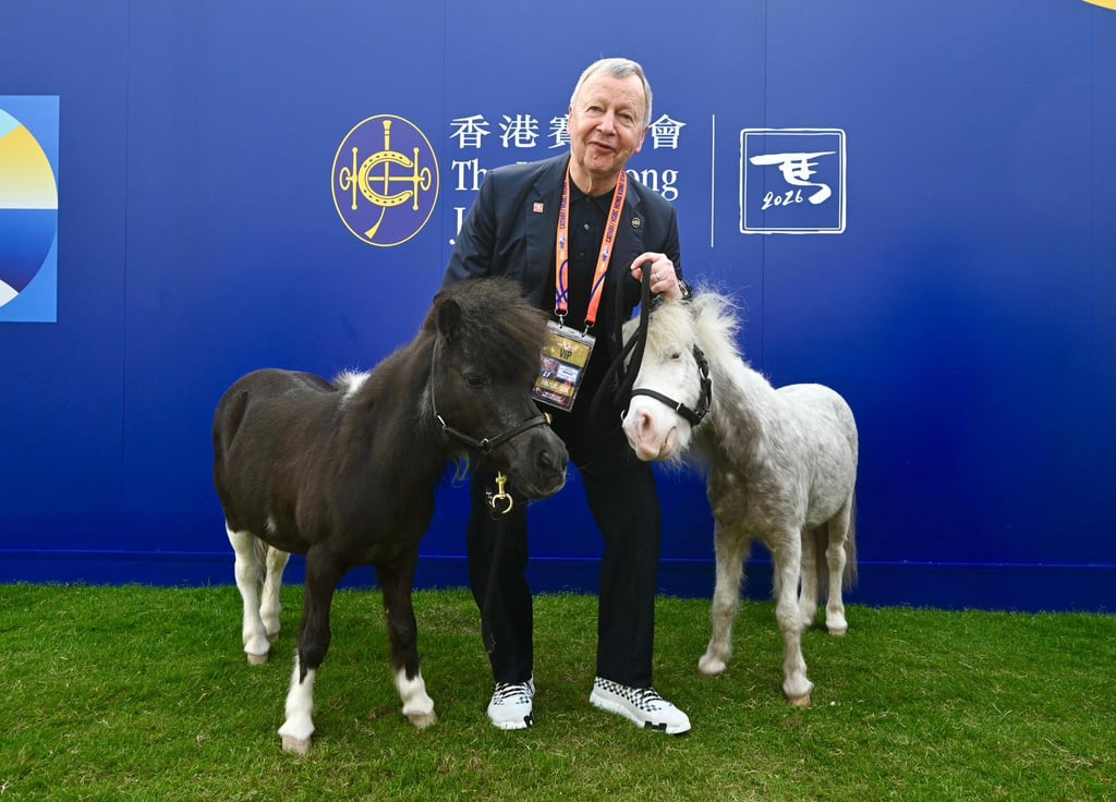 Club Chief Executive Officer Winfried Engelbrecht-Bresges at Jockey Club booth with  Shetland ponies.