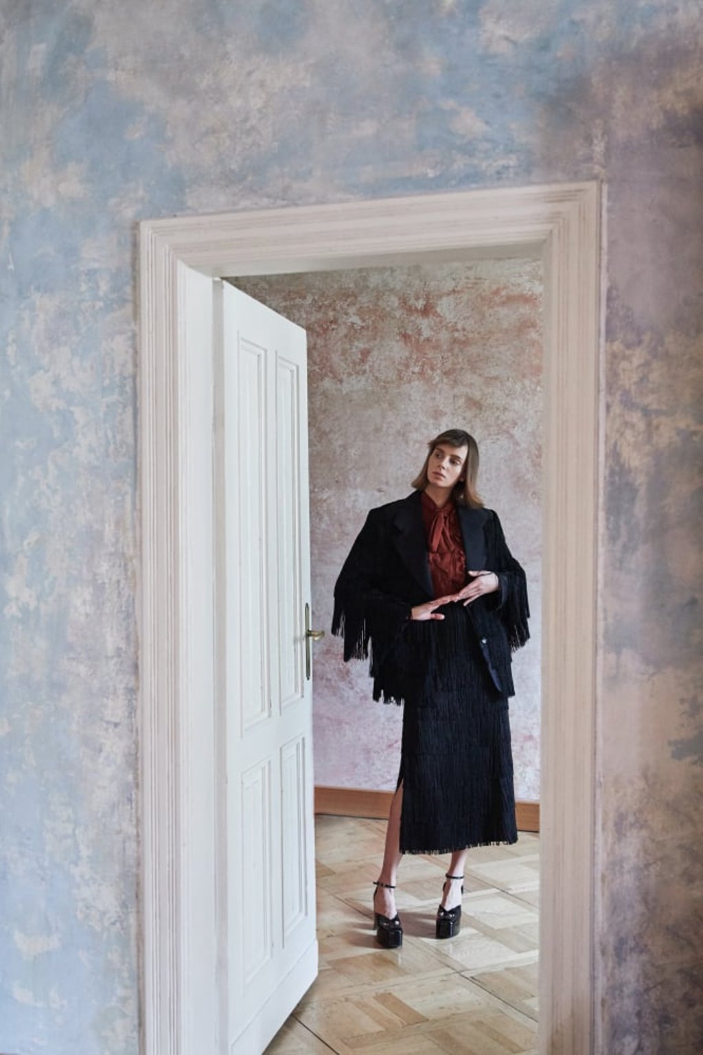 Celine top, Prada jacket and skirt, Gucci shoes; all prices upon request. Photo: Piotr Serafin