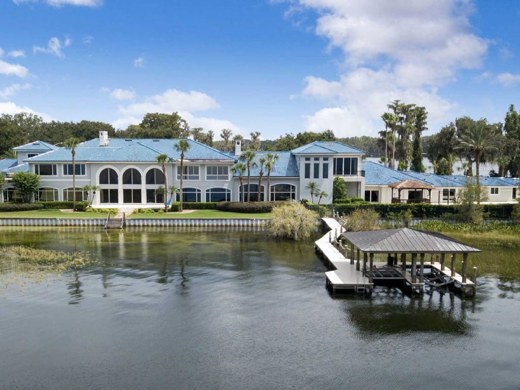 The mansion even has its own mini pier. Photo: Compass Florida