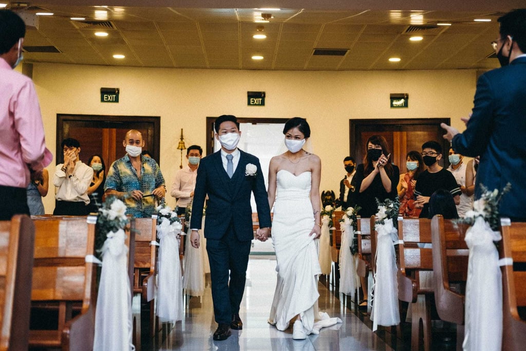 Gina Loh, 33, and Shoshi Kudo, 34, walk down the aisle. Photo: Bottle Groove Photography Gina Loh, 33, and Shoshi Kudo, 34, walk down the aisle. Photo: Bottle Groove Photography