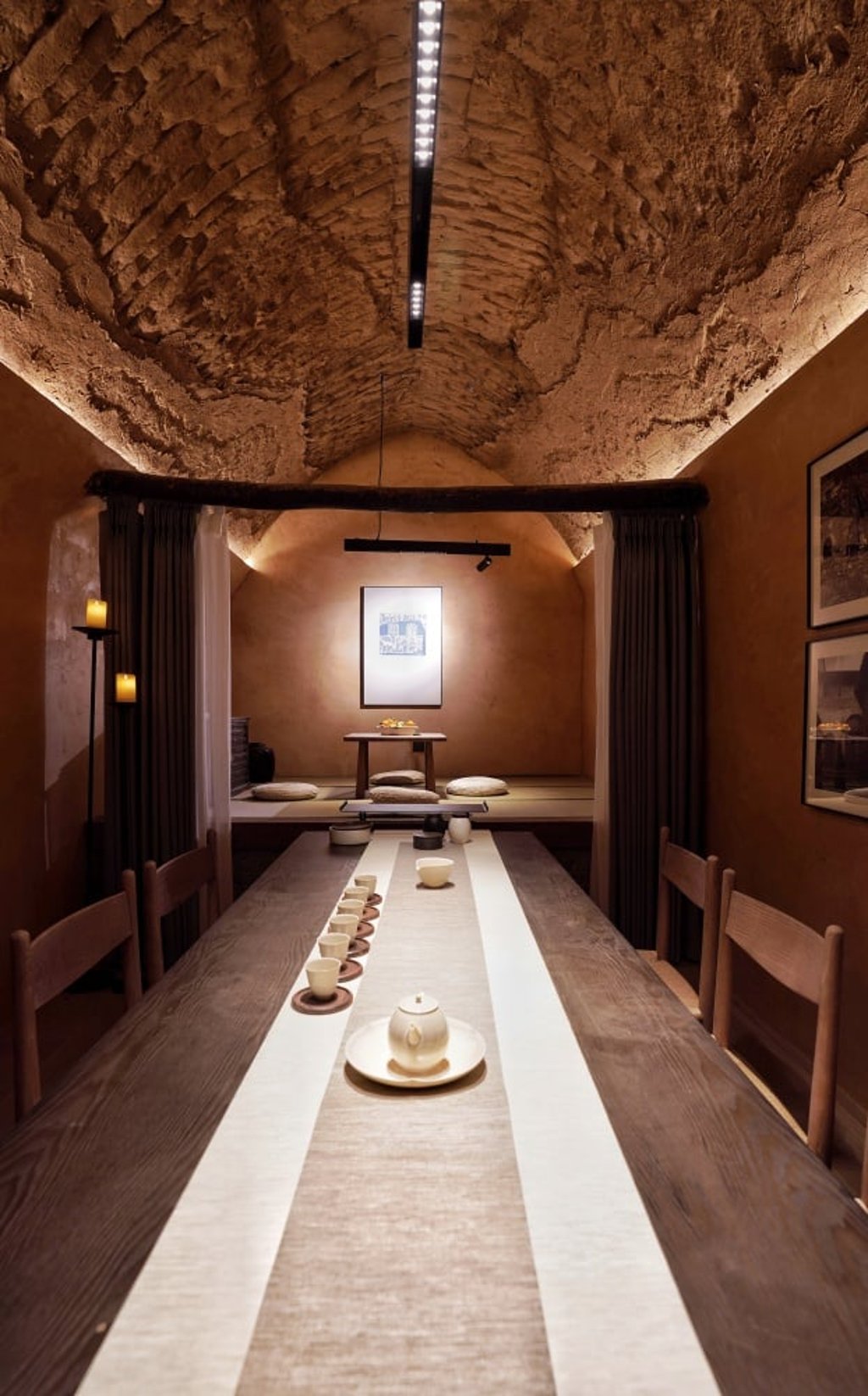 The original weathered and rough-textured roofs of the cave homes have been retained in the hotel development.