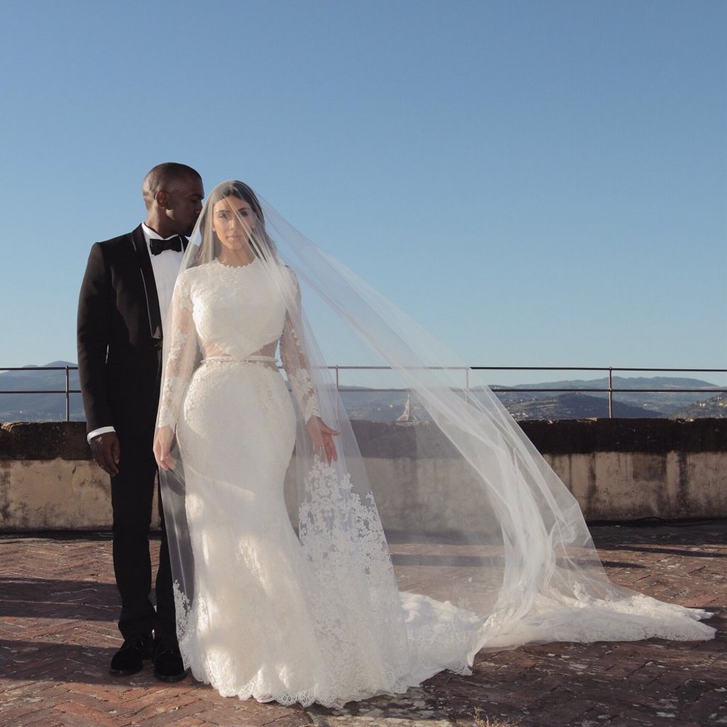 West and Kardashian pose for wedding photos. Photo: @kimkardashian/Instagram West and Kardashian pose for wedding photos. Photo: @kimkardashian/Instagram