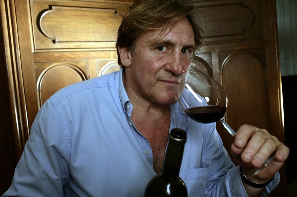 Gerard Depardieu in 2005, testing some of the wine he produces with partner Bernard Magrez. Long regarded as a national treasure in France, his increasingly errant behaviour has changed opinions. This week police revealed he is the subject of a rape investigation. Photo: Getty Images
