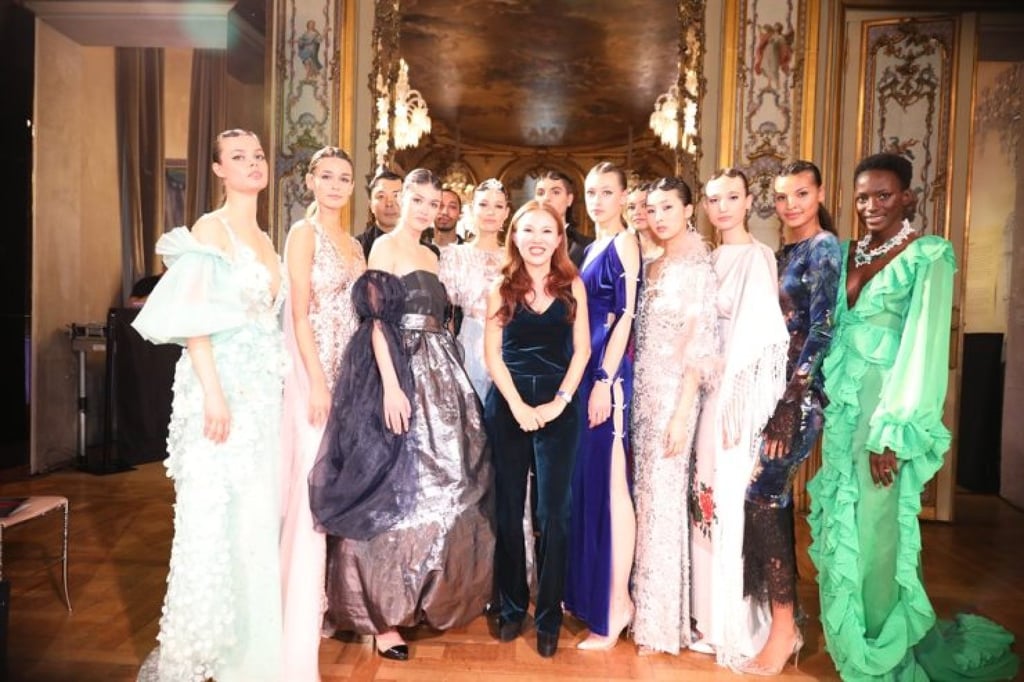 Kay Kim, centre, after holding a fashion show at the Baccarat Museum in Paris. Photo: courtesy of Kay Kim Kay Kim, centre, after holding a fashion show at the Baccarat Museum in Paris. Photo: courtesy of Kay Kim