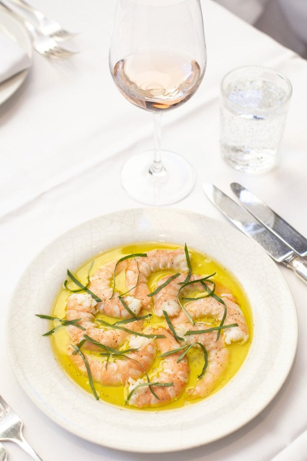 Prawns in olive oil at LPM Restaurant & Bar. Photo: La Petite Maison Prawns in olive oil at LPM Restaurant & Bar. Photo: La Petite Maison