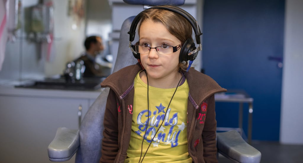 A young girl has an audiogram to test her hearing at Lyon-Nord Rillieux Clinic in Lyons, France. Photo: Getty Images